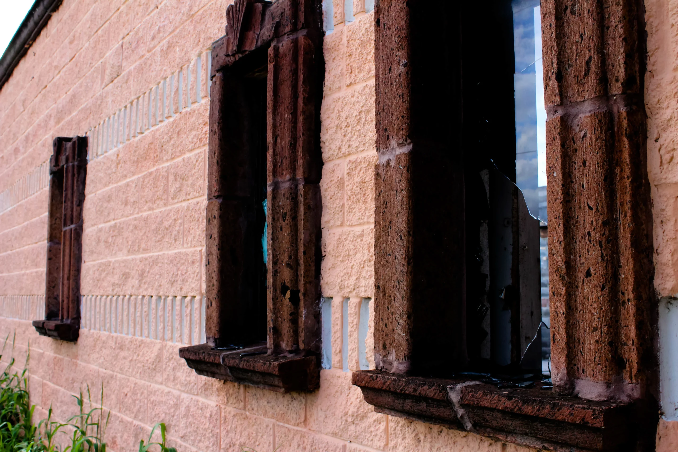 old building with broken windows scaled